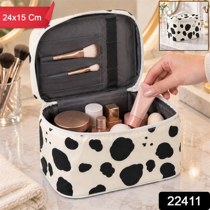 Wukusy spotted makeup zipper pouch with carry handle, compact travel organizer in black and white pattern, 24x15 cm.