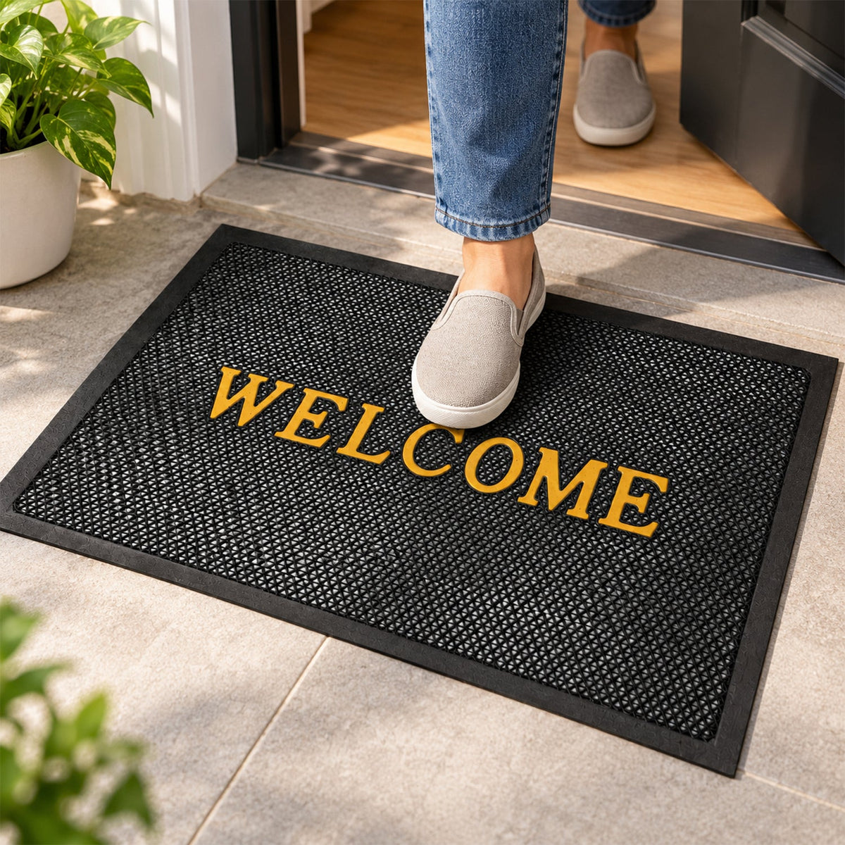 Wukusy welcome door mat with textured mesh, 57x37.5 cm, suitable for home entrance, featuring a friendly message and durable design.