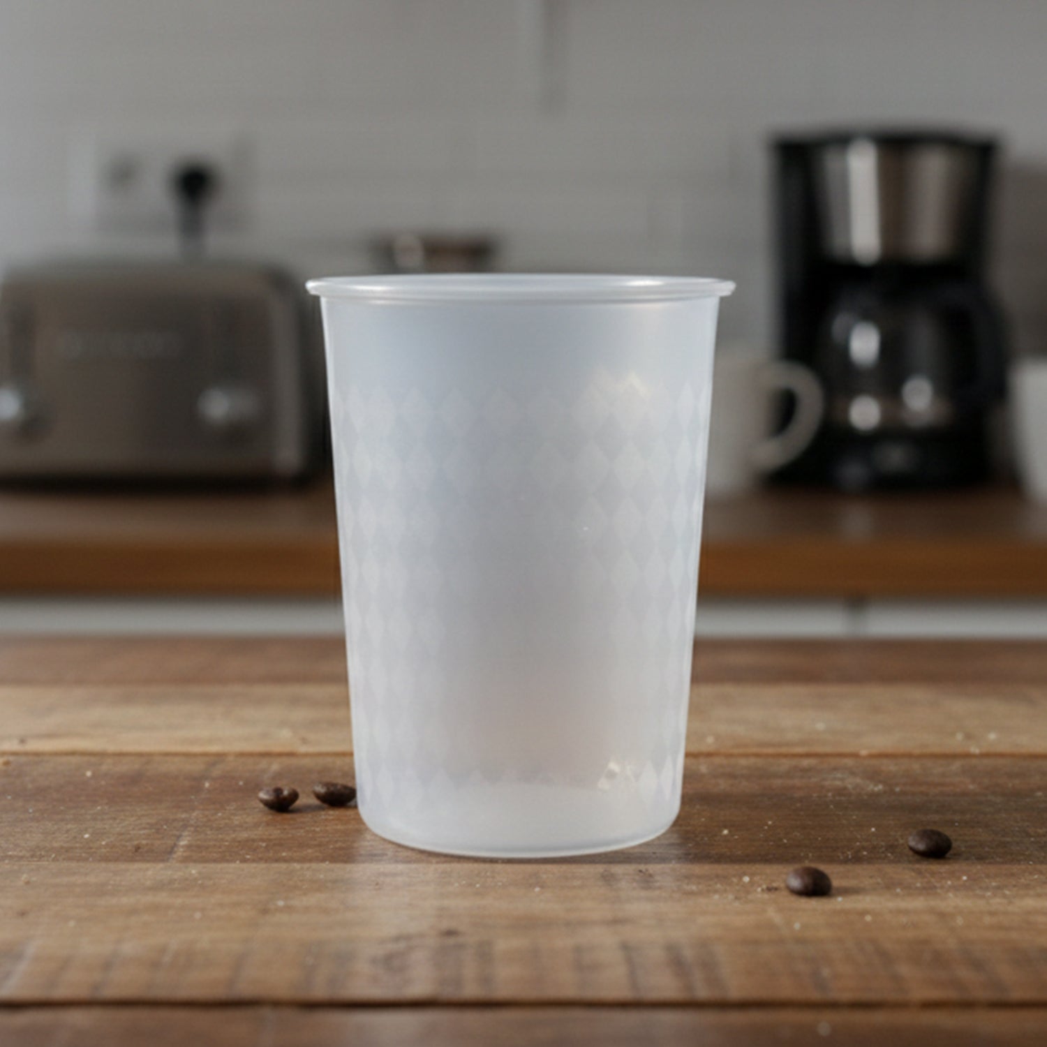 Clear reusable plastic drinking glass from Wukusy, 200ml capacity, with a smooth, transparent surface and sturdy design.