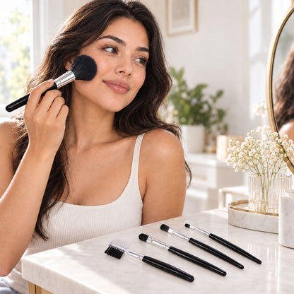 Wukusy mini makeup brush set with five compact brushes for face, eye, brow, and lip makeup, displayed on a white background.