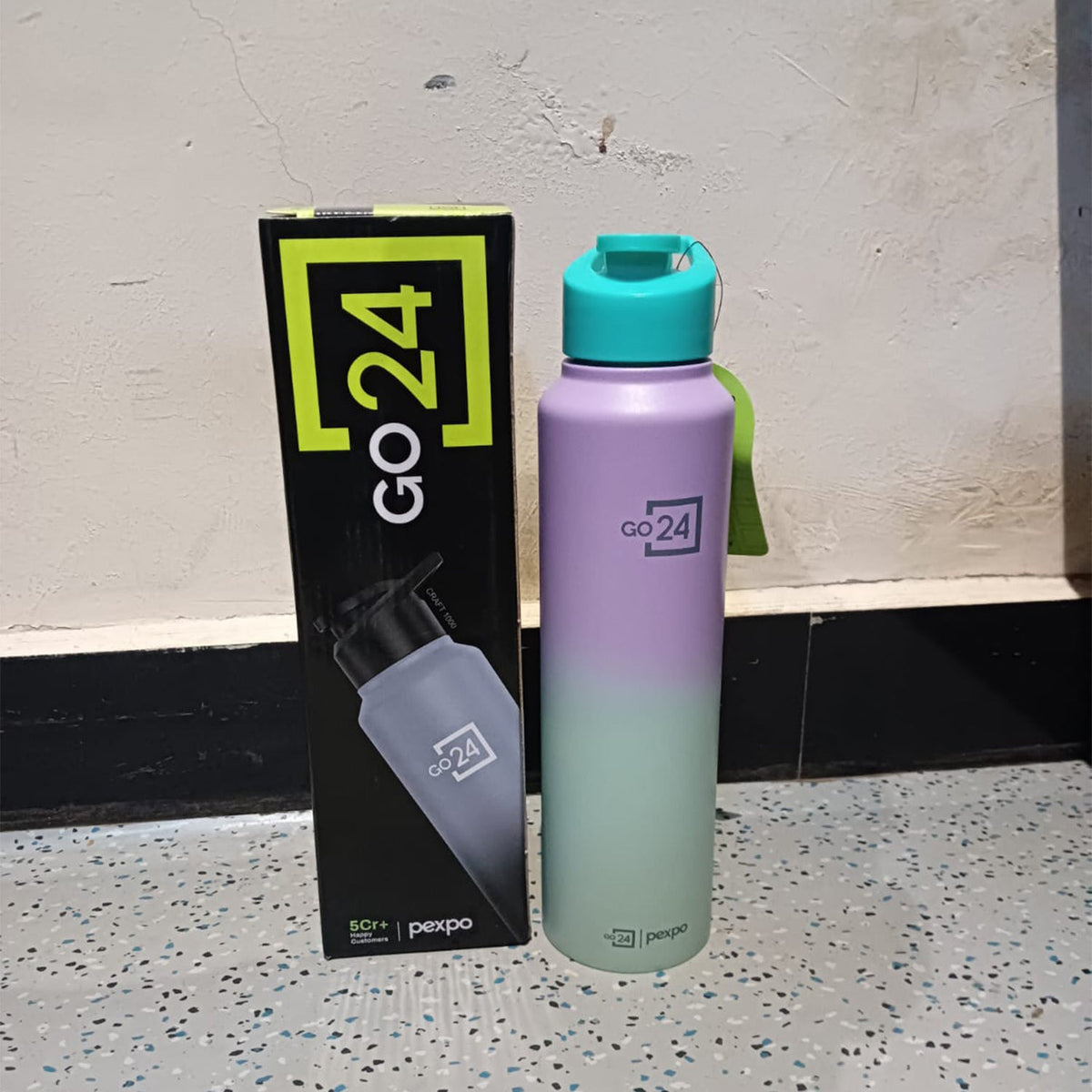 Wukusy stainless steel water bottle with carry loop, 1000 ml capacity, suitable for office and travel, shiny silver finish
