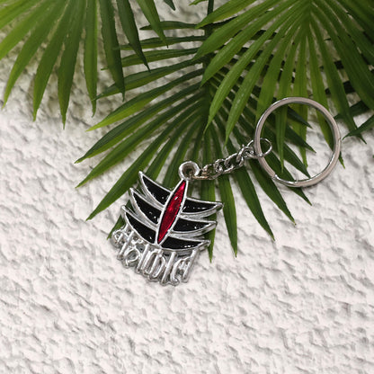 Wukusy Mahakal symbol metal keychain featuring intricate design, ideal for attaching to keys or bags.