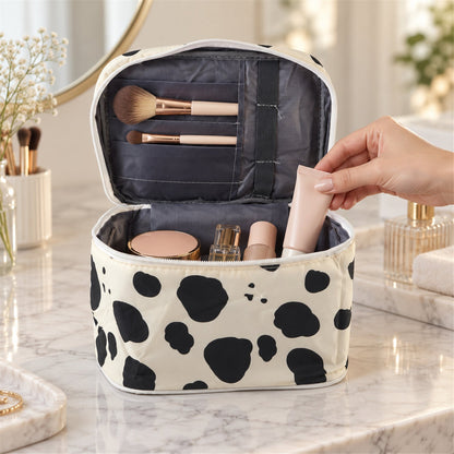 Wukusy spotted makeup zipper pouch with carry handle, ideal for travel organization, measuring 24x15 cm, featuring a stylish spotted design.