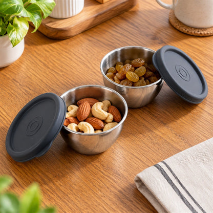 Set of two small Wukusy Apex stainless steel containers with lids, 180ml capacity for food storage or organization.