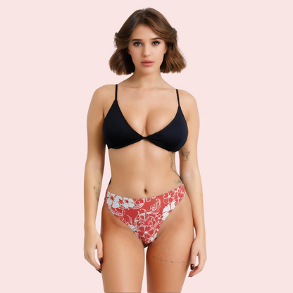 Red and white floral print high-cut thong bikini bottom by Snazzyway, featuring a sleek, minimal design with vibrant floral pattern.