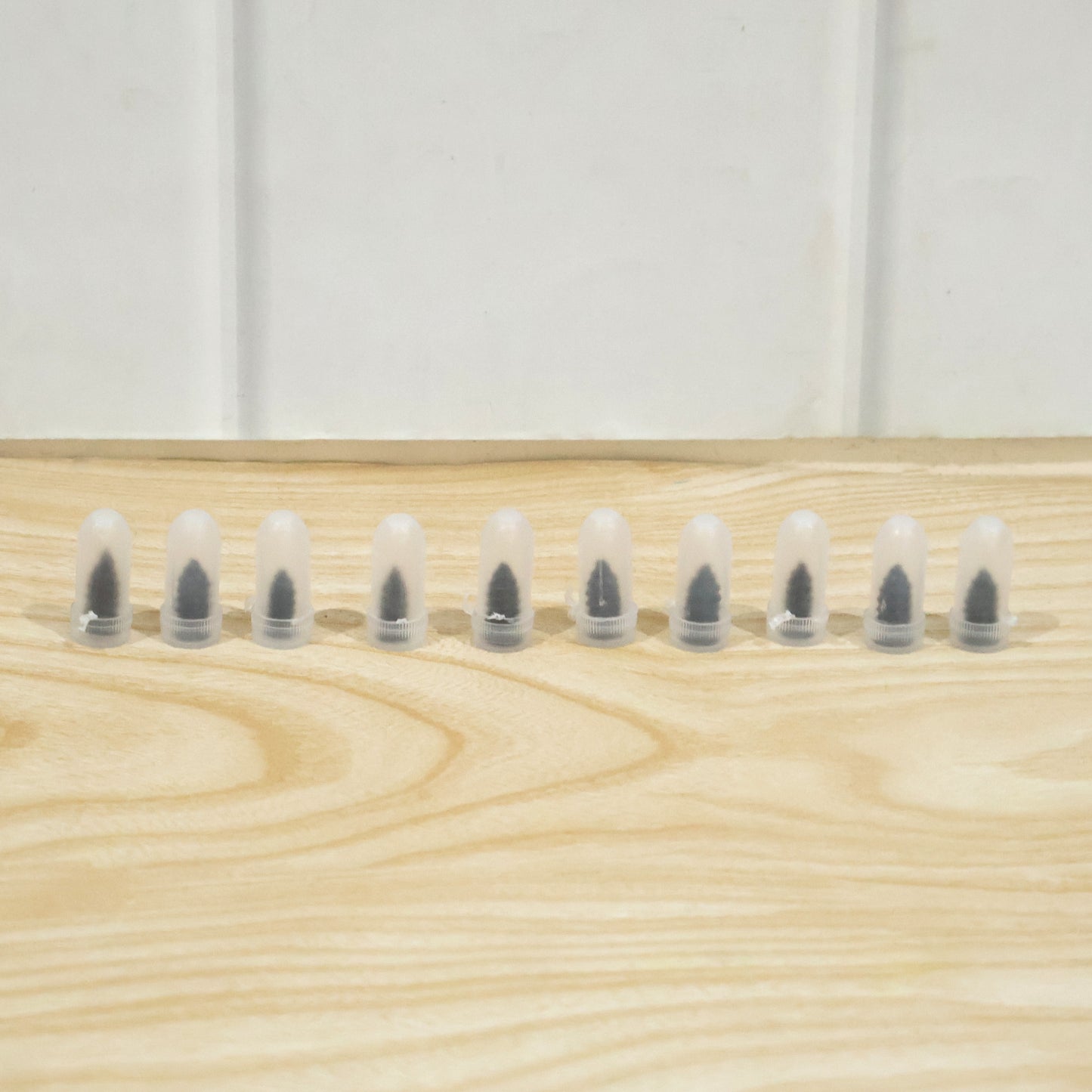 Set of 10 black Wukusy car bike tire puncture repair nails and screws for quick and easy flat tire fixes.