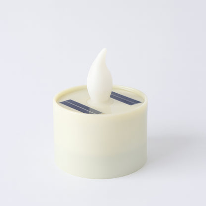 Wukusy solar powered LED flameless candle light with realistic flickering flame in a glass holder, outdoor decorative lighting.
