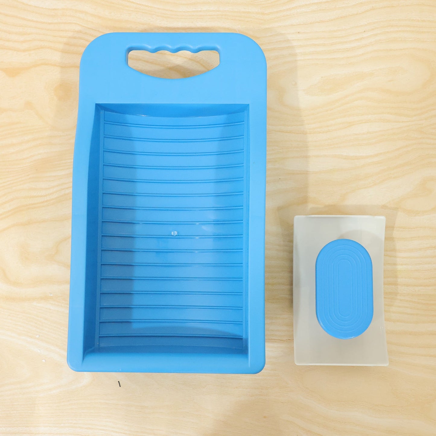 Wukusy portable plastic mini washing board with soap holder, ideal for hand washing socks and small laundry items.