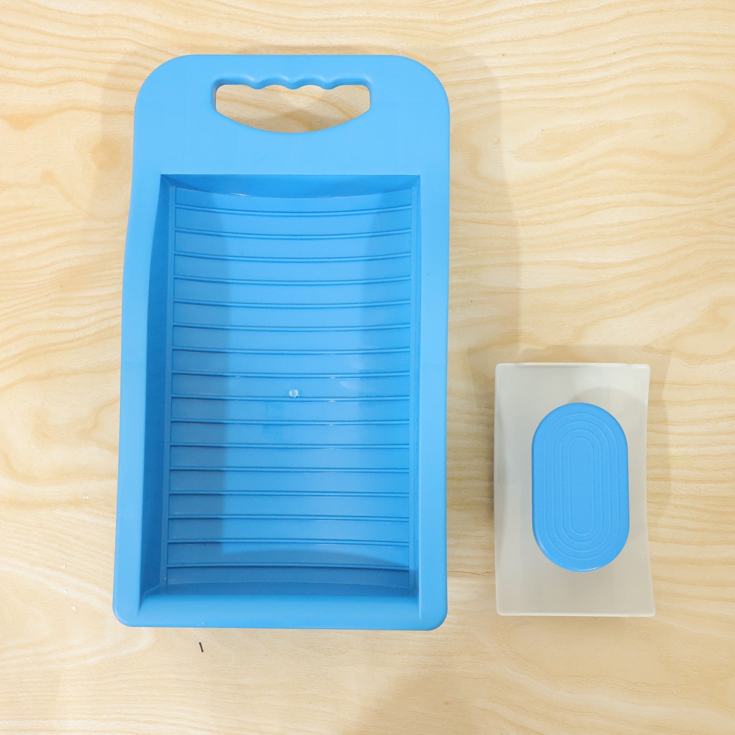 Wukusy portable plastic mini washing board with soap holder, ideal for hand washing socks and small laundry items.