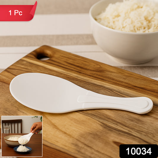 Wukusy plastic non-stick rice serving paddle, 6-inch kitchen utensil for serving and handling cooked rice.