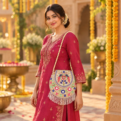 Traditional peacock embroidered fringe jute purse by Wukusy, 24x24 cm sling bag with intricate embroidery and decorative fringe details.
