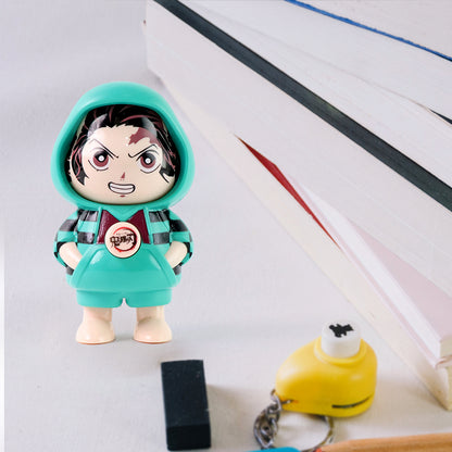 Cute cartoon character design action figure keychain by Wukusy featuring a colorful toy with a playful character design.