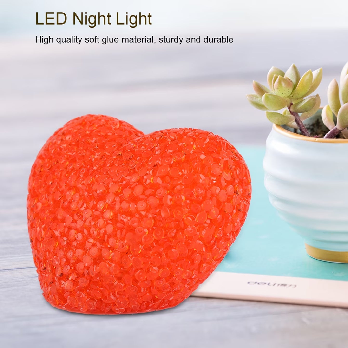 Wukusy heart-shaped LED night lamp with crystal texture emitting soft red glow, perfect for cozy bedroom lighting.
