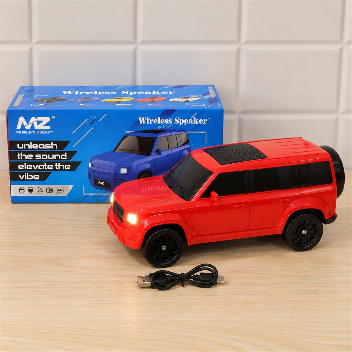 Wukusy car-shaped wireless speaker with light-up headlights and audio controls, designed for portable music playback.