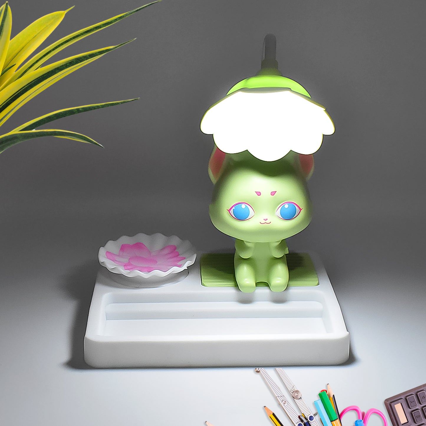 Wukusy cute cartoon LED desk light with base, ideal for home improvement and desk illumination, shown turned on.