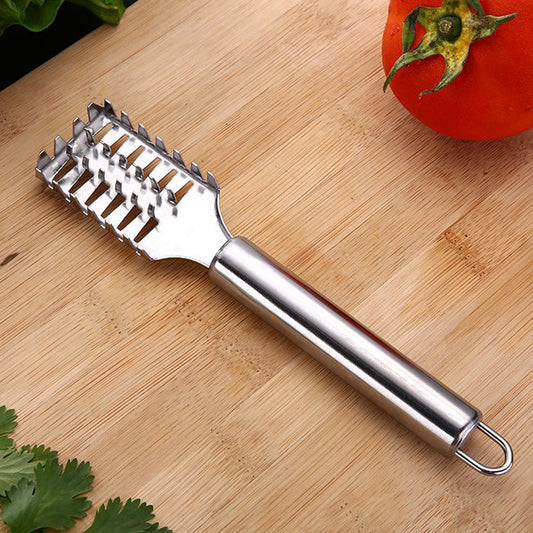 Wukusy fish scale remover scraper made of stainless steel, featuring sawtooth edges for easy fish scale removal and cleaning in the kitchen.