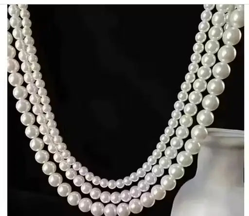 Elegant off-white pearl necklace with multiple layers by Ekom, perfect for women's fashion jewelry.