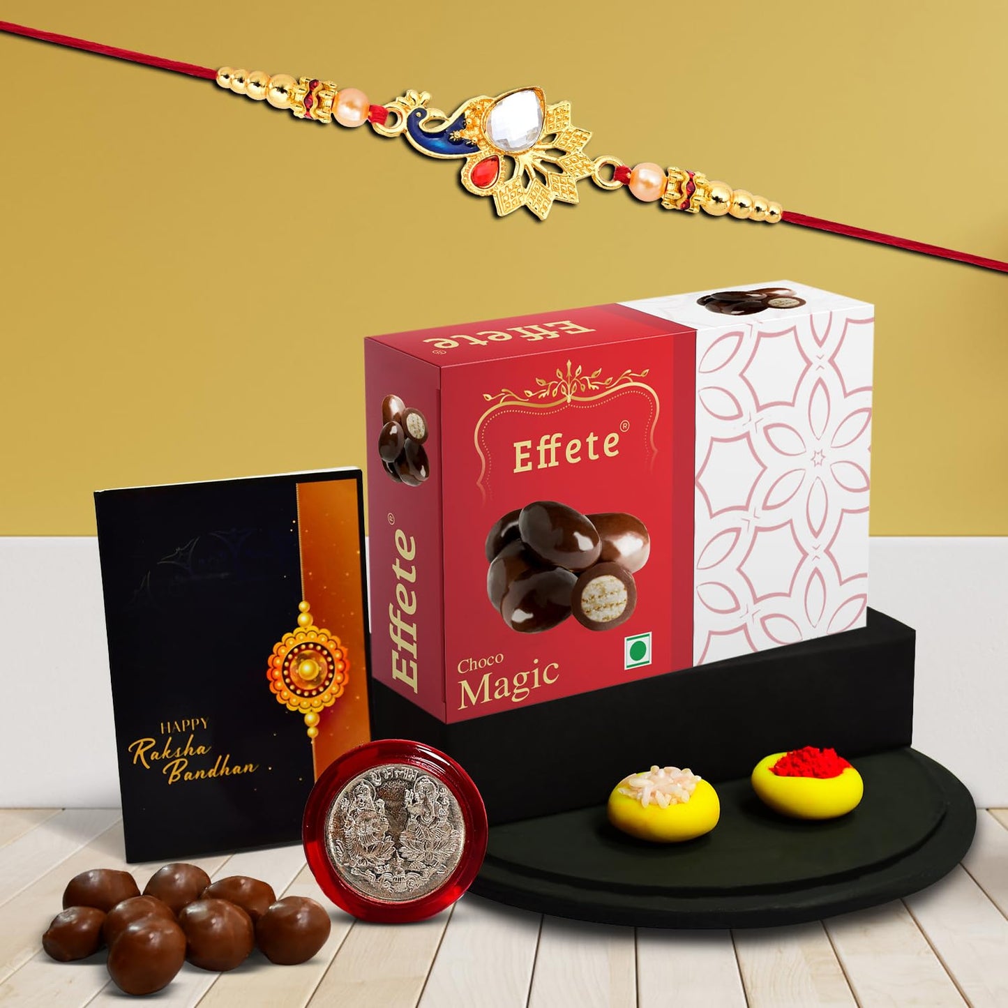 Wukusy Rakhi combo with chocolate gift pack, featuring a decorative fancy Rakhi for brother and a 32g chocolate gift pack.
