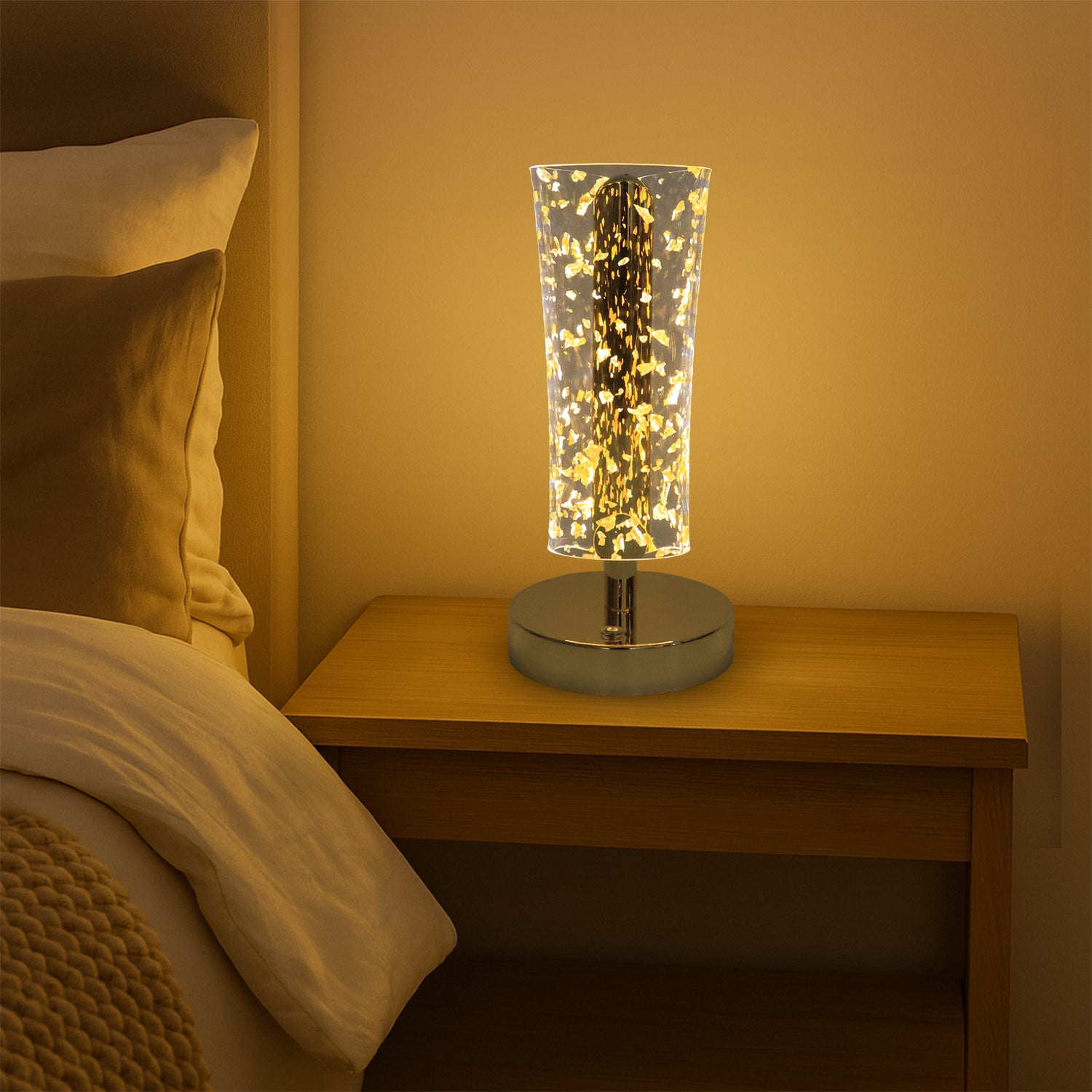 Luxury golden crystal LED table lamp by Wukusy with a sleek design and warm illumination, featuring crystal accents and a modern gold finish.