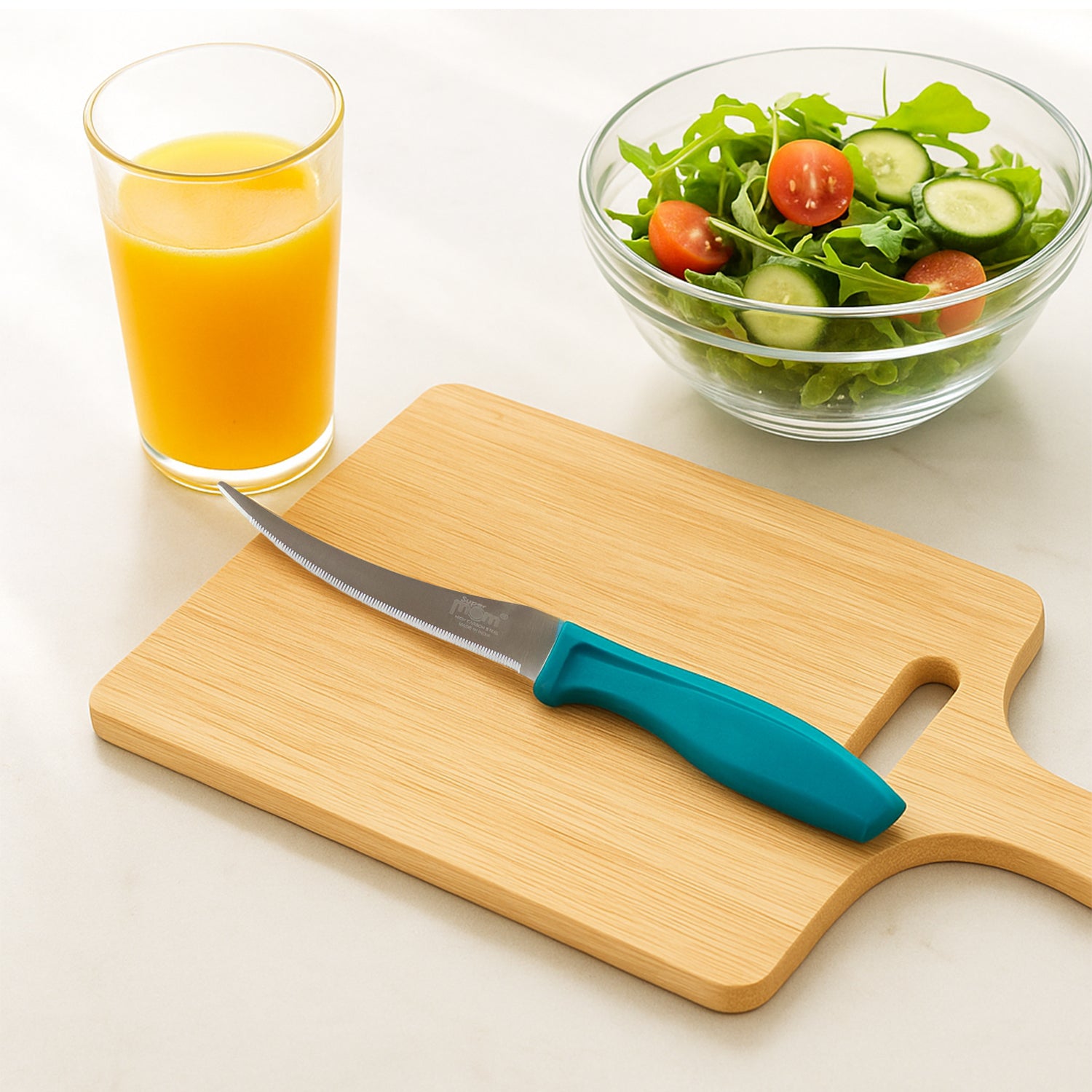 Wukusy Supermom stainless steel tomato knife with ergonomic handle, ideal for slicing fresh tomatoes in home and kitchen use.