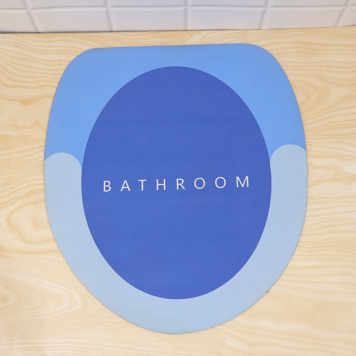 Wukusy rounded circle design bath rug with soft, anti-slip shower mat in 40x44 cm size, featuring a modern circular pattern.