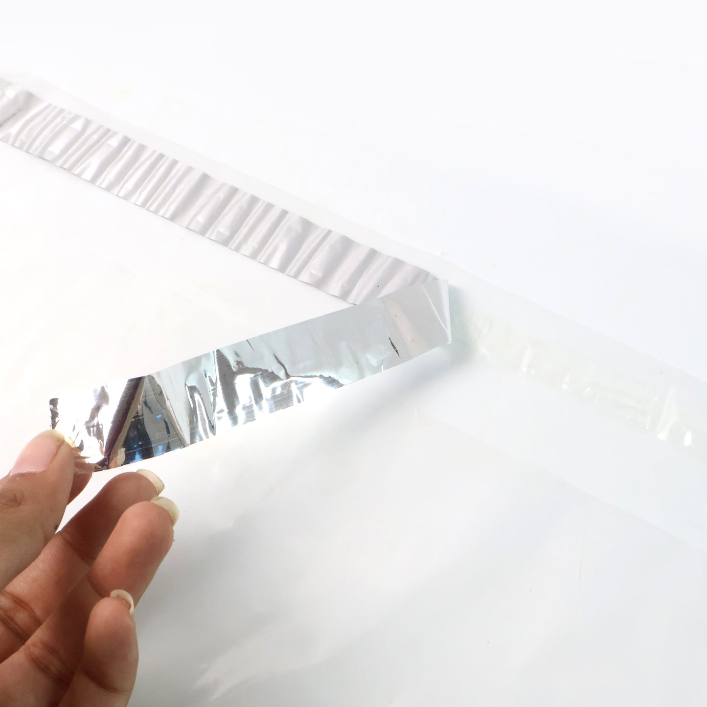 Wukusy self-adhesive courier polybags, 12x14 inches, 100-pack, ideal for office shipping and mailing packages.