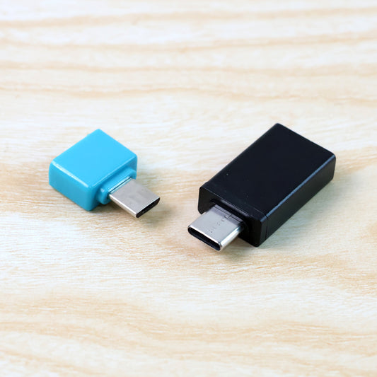 Wukusy USB Micro Type-C to USB-A OTG adapter set showing two compact mobile accessories for device connectivity.