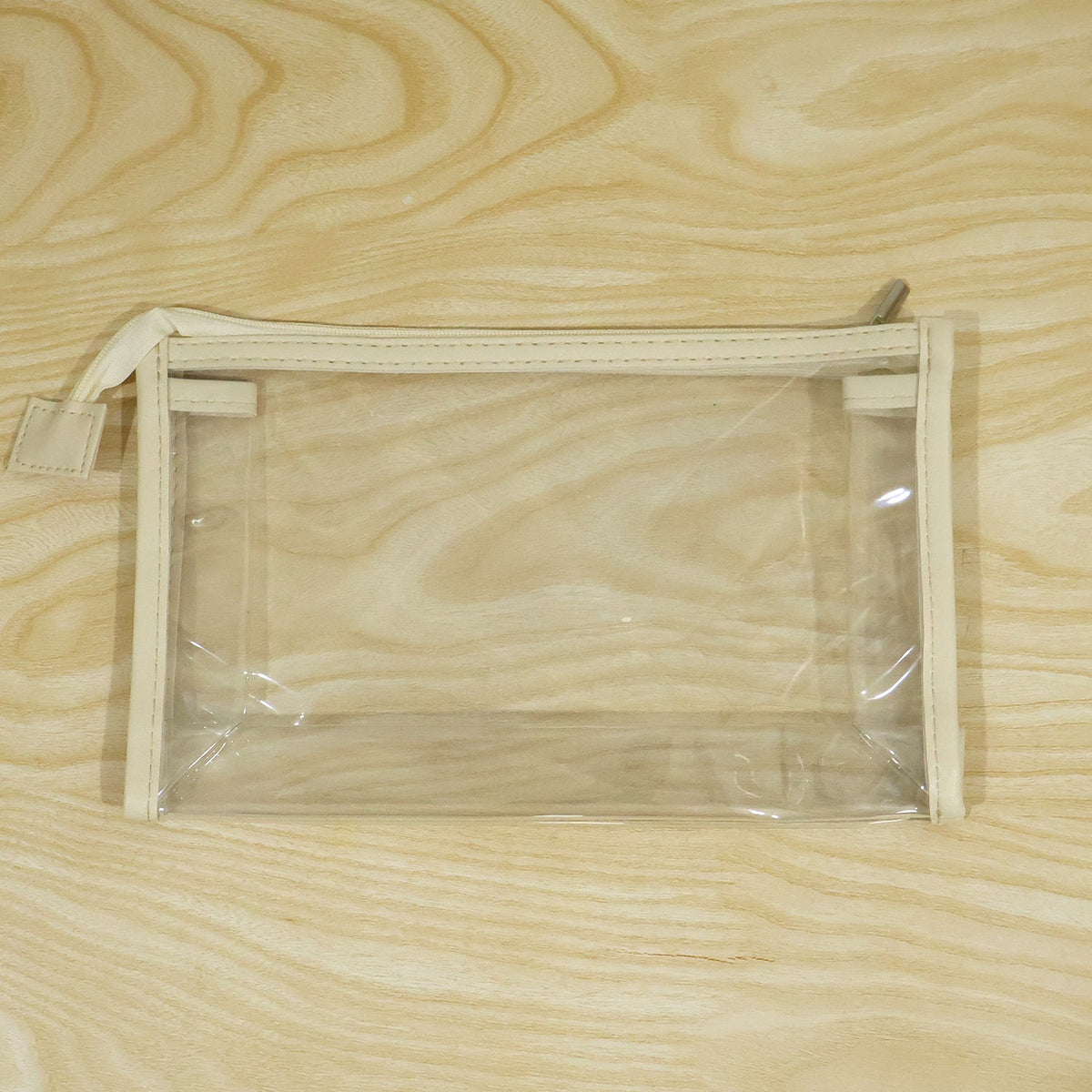 Clear PVC makeup zipper pouch for travel and toiletries, 23x14 cm, by Wukusy, showing transparent material with zipper closure.