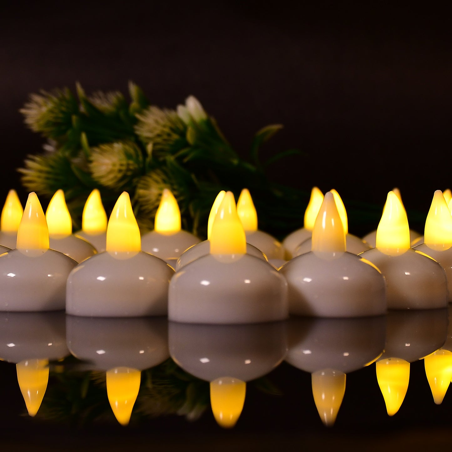 Set of 12 Wukusy flameless floating tea light candles for home decor, featuring battery-operated tealights perfect for weddings.