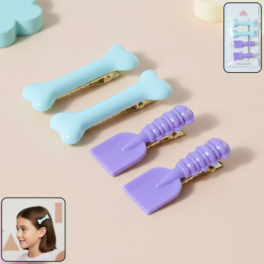Set of four cute cartoon hair clips by Wukusy featuring colorful, playful designs for kids' hair accessories.