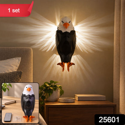 Wukusy eagle-shaped LED ambient wall light with remote and magnetic holder, mounted on a wall in a modern home setting.