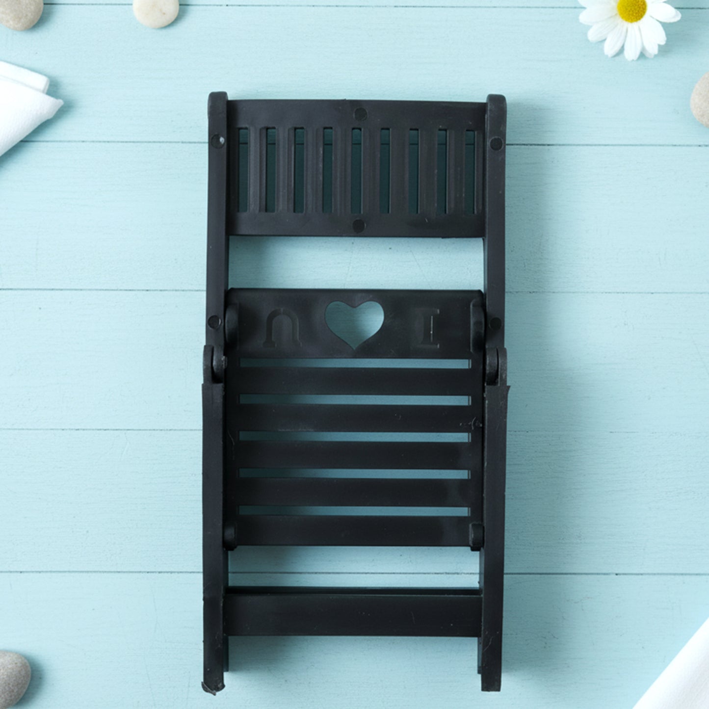 Black mini chair-shaped mobile stand holder by Wukusy, compact and stylish for holding smartphones securely.