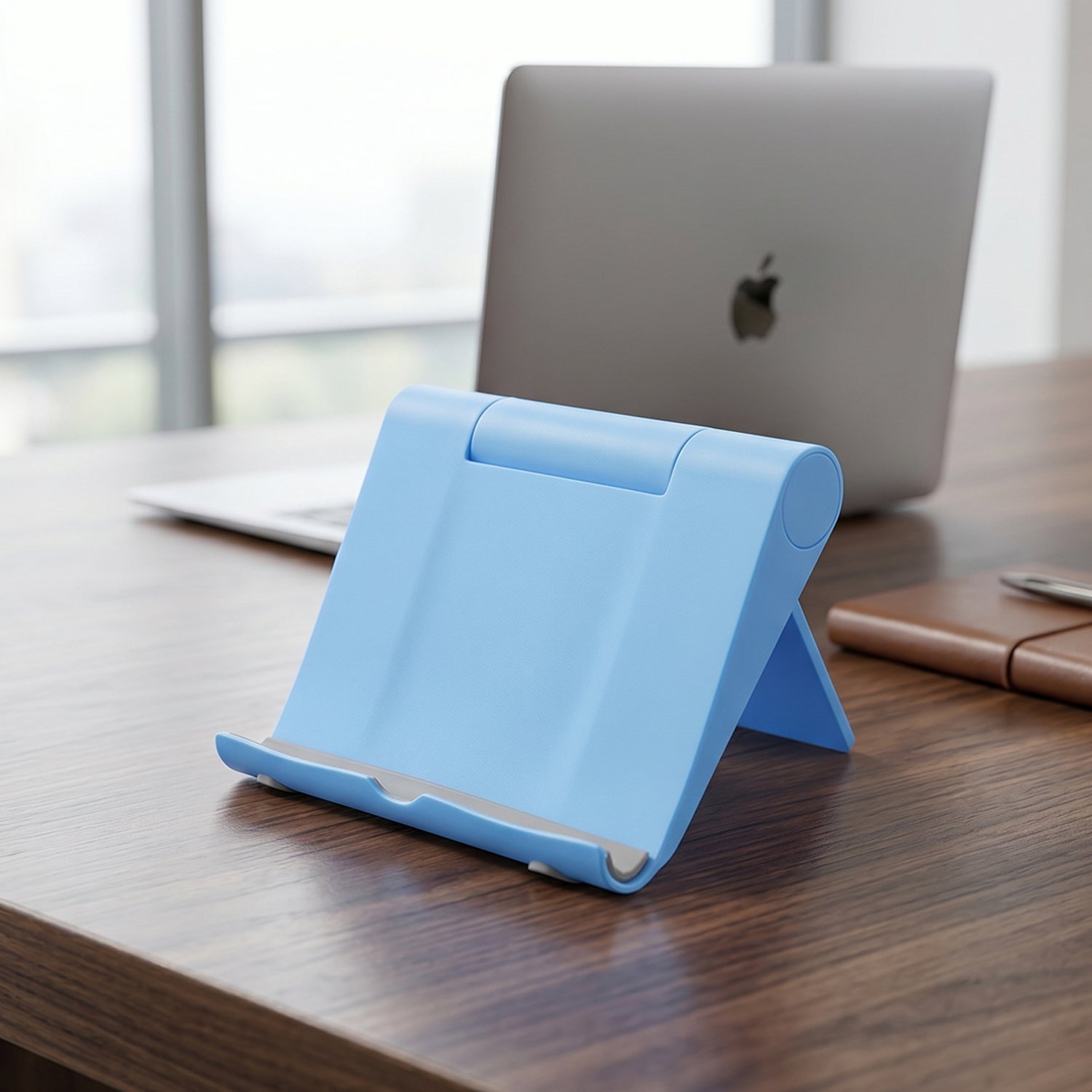 Wukusy plastic foldable mobile phone stand on a desk, perfect for video calls and hands-free viewing.