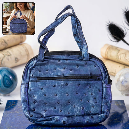 Metallic blue mini zipper handbag with ostrich pattern for women by Wukusy, showcasing its stylish textured leather design.