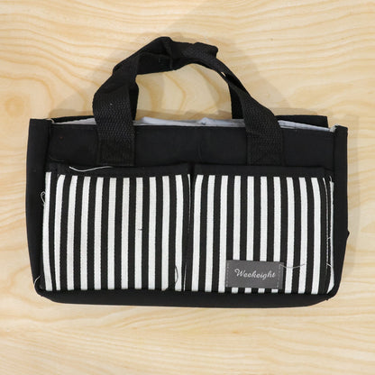 Wukusy multipurpose travel organizer bag with handles, 27x16 cm, showing compartments for toiletries and accessories.