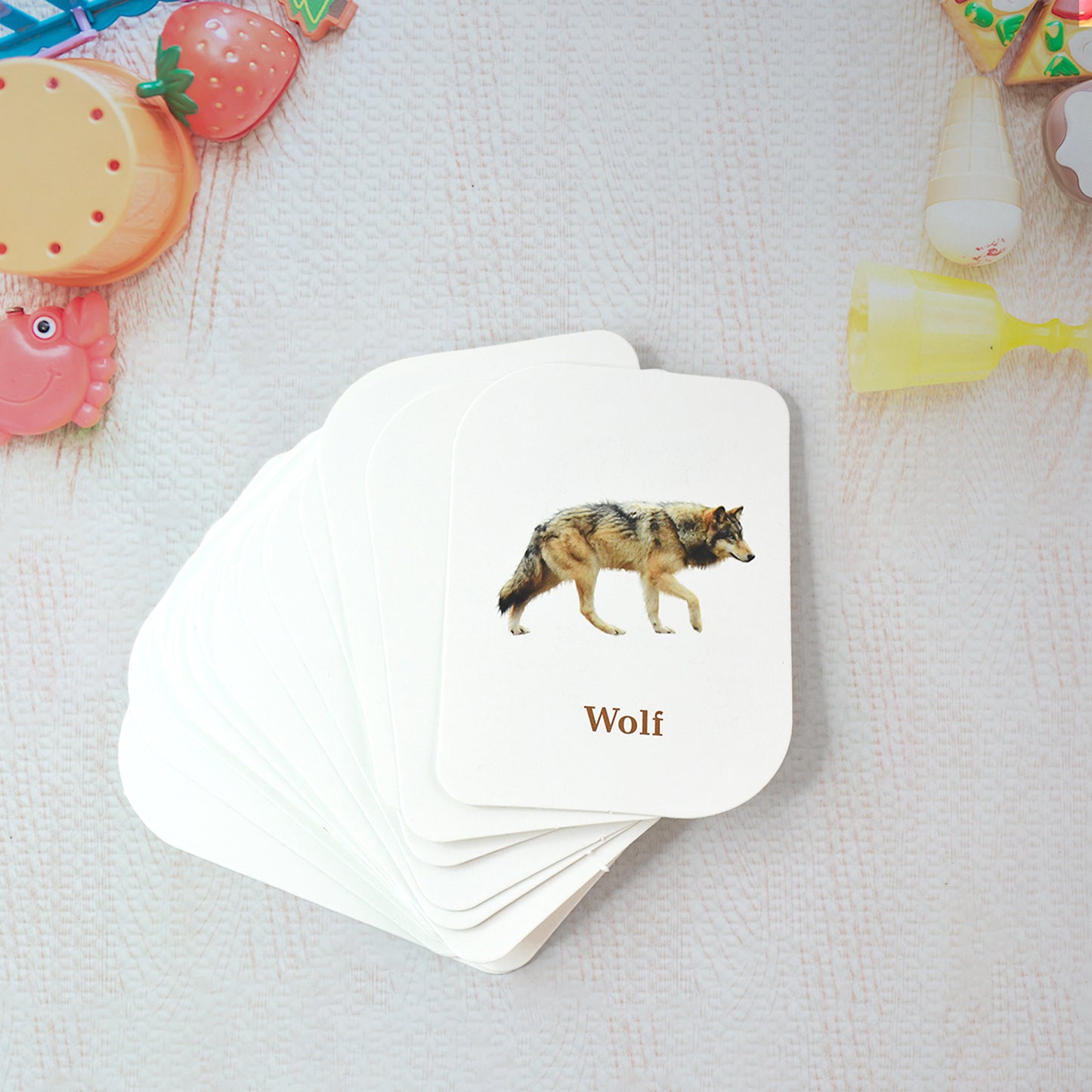 Wukusy Kidkraft 32-piece animal flash cards set featuring colorful illustrations of various animals for kids' educational play.