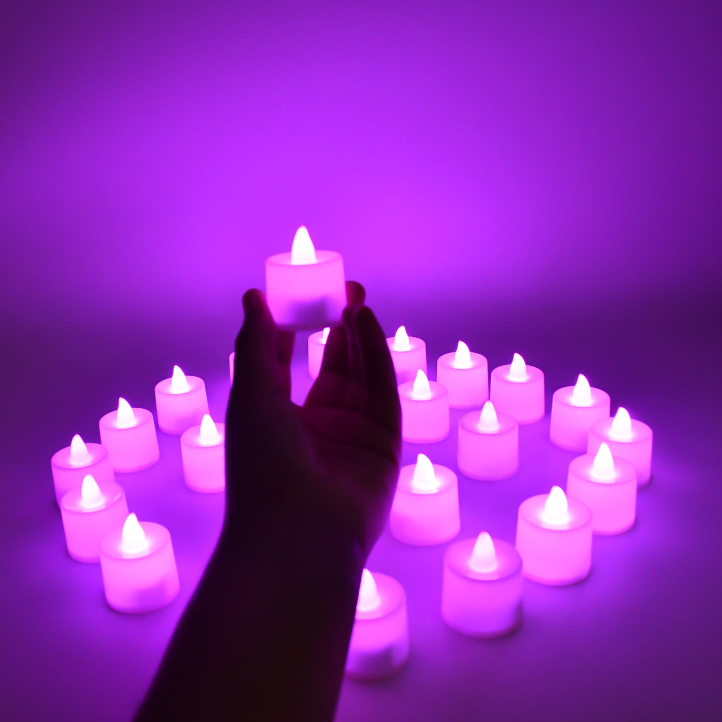 Set of 24 Wukusy flameless LED tealights with smokeless plastic candles, ideal for home decor and safe ambient lighting.