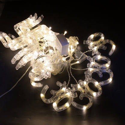 Wukusy 8320 Swastik Om decorative string lights with 12 hanging props, 138 LED Diwali home decor lights for bedroom or balcony.