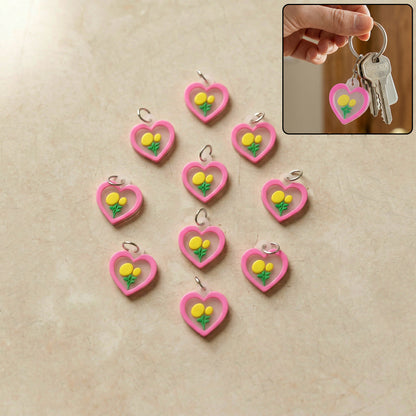 Set of 10 Wukusy heart flower design bag charm keychains featuring colorful, cute floral and heart patterns.