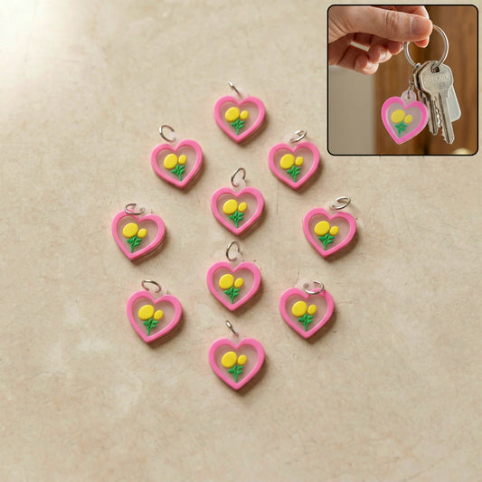 Set of 10 Wukusy heart flower design bag charm keychains featuring colorful, cute floral and heart patterns.