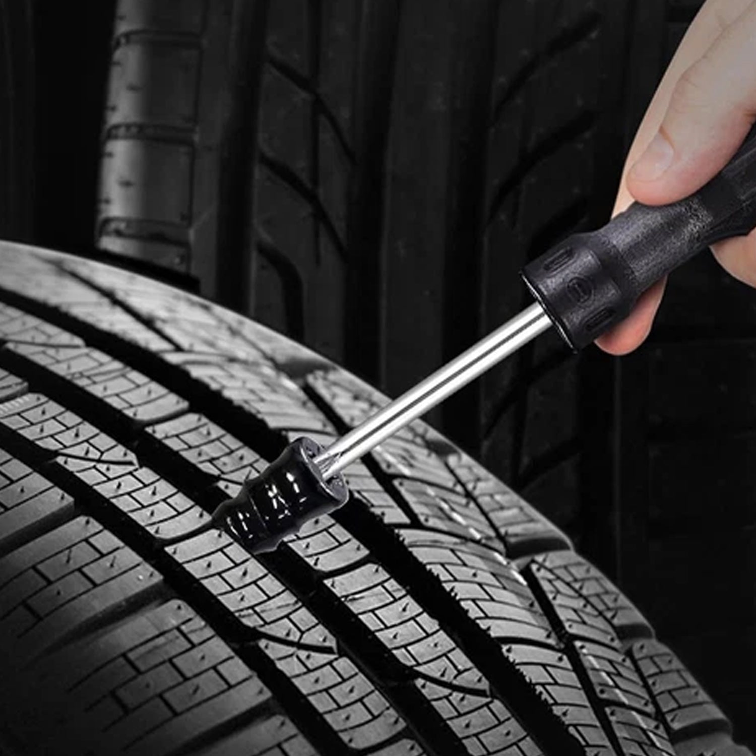 Set of 10 black car bike tire puncture repair nails and screws by Wukusy, used for fixing flat tires.