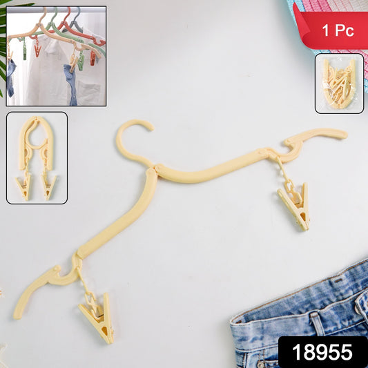 Wukusy foldable cloth hanger with dual clips for versatile home use, shown in a folded position with clips open and ready for hanging.