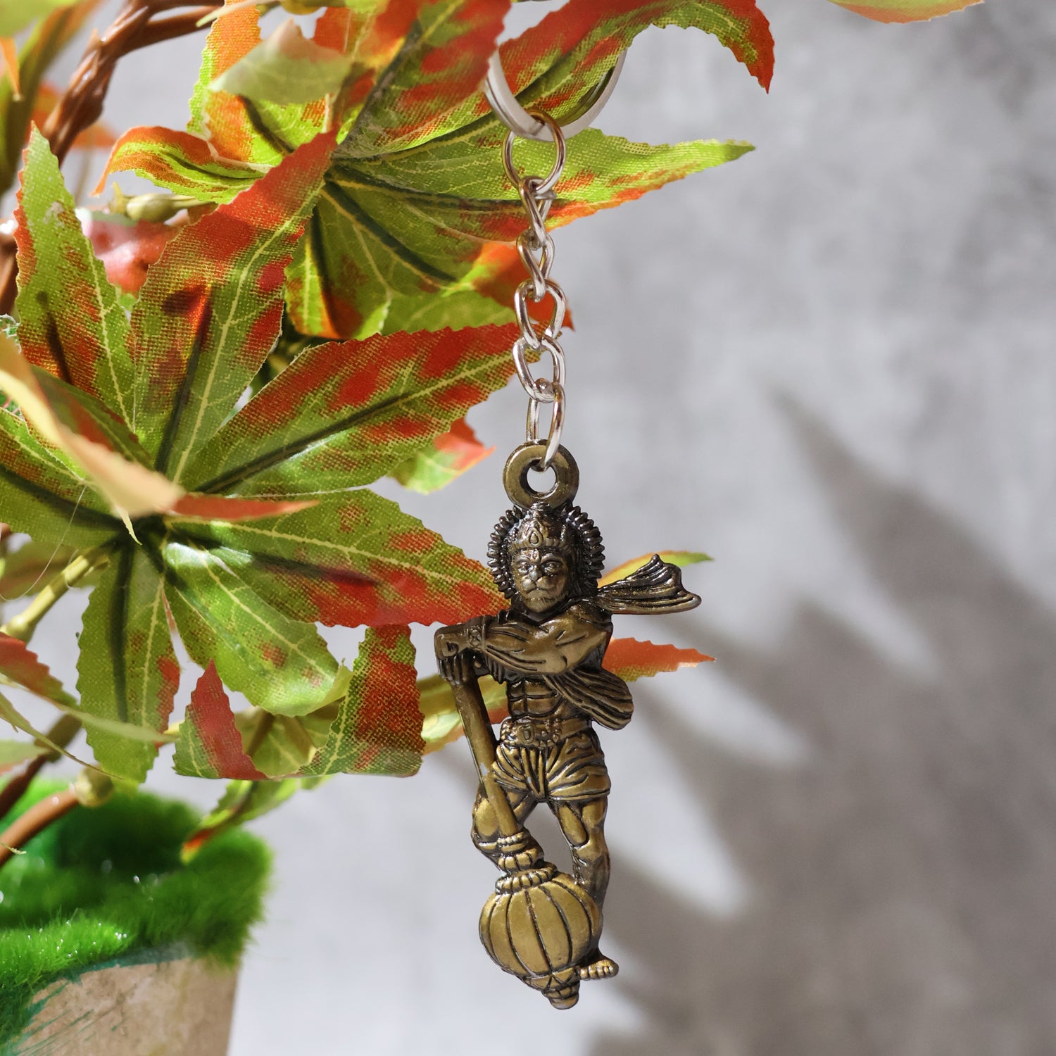Elegant Lord Hanuman metal keychain from Wukusy featuring detailed Hanuman figure, ideal for key or bag decoration.