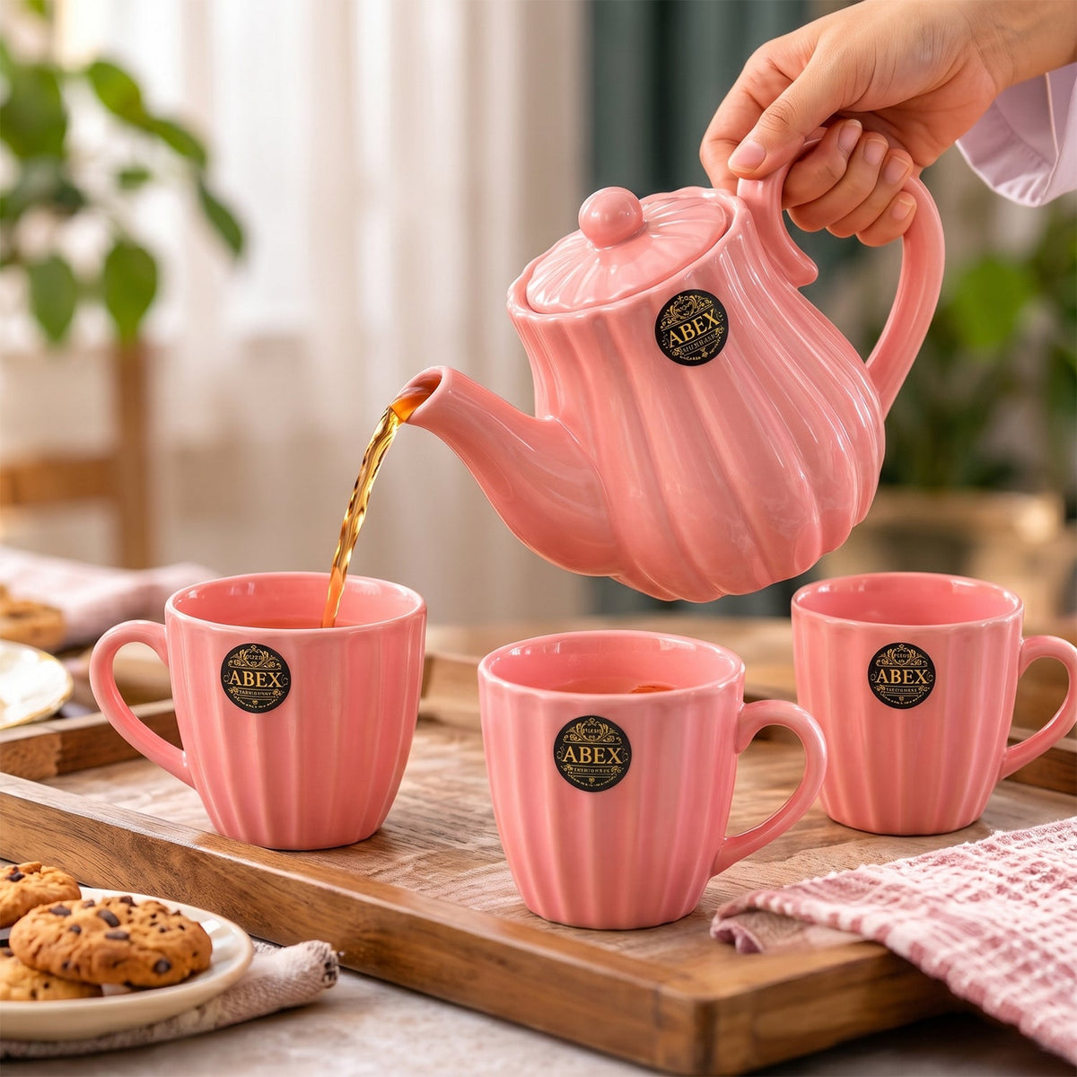 Wukusy ribbed ceramic tea set with teapot and 4 cups, perfect for serving or gifting, shown on a wooden surface.