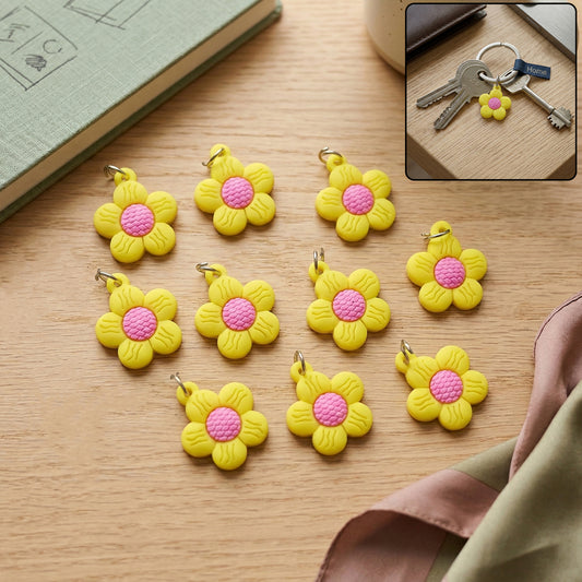Set of 10 cute flower-shaped bag charm keychains by Wukusy, colorful and decorative accessories for bags and backpacks.