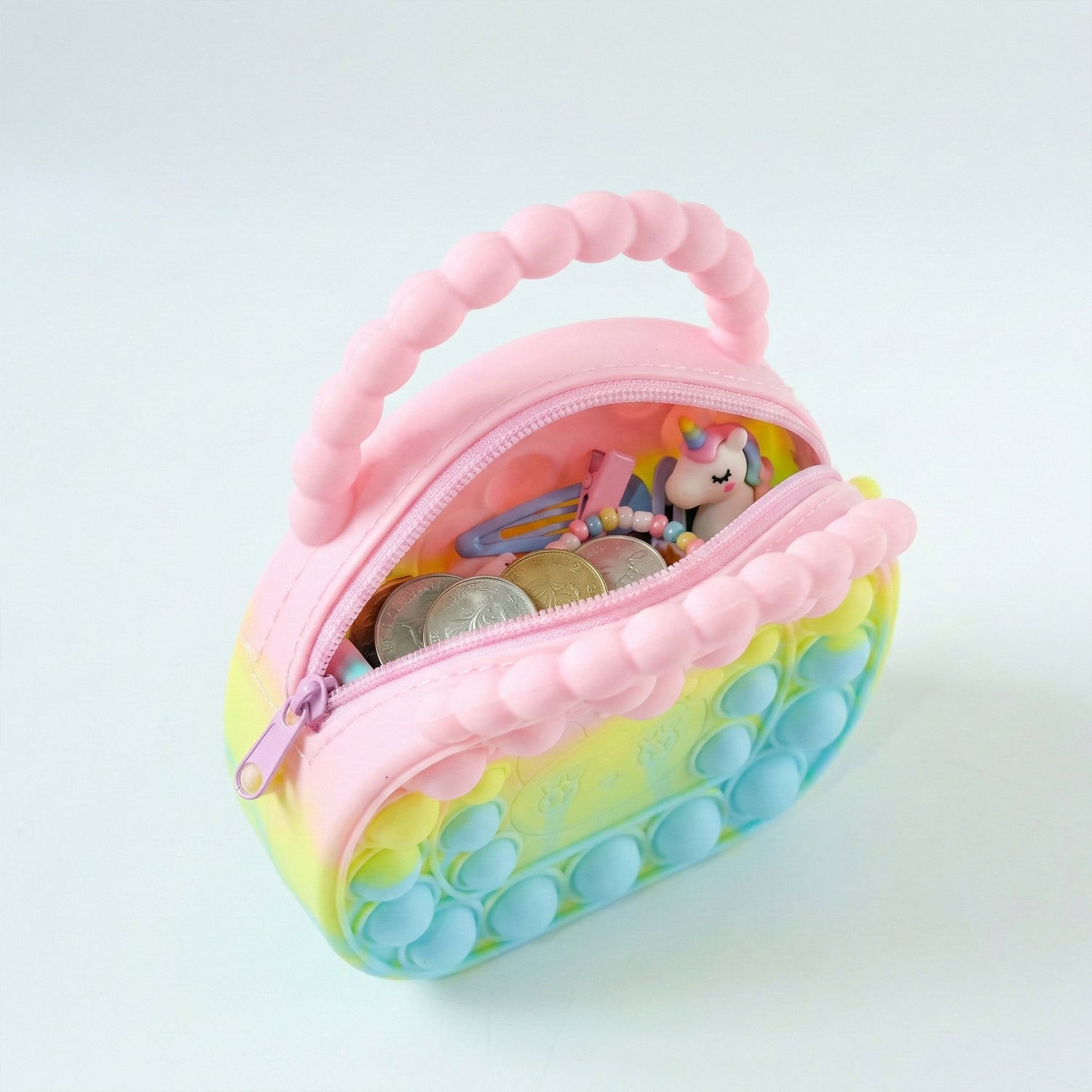 Rainbow round silicone Pop It coin purse by Wukusy, featuring colorful silicone bubbles and a compact, playful design for daily use.