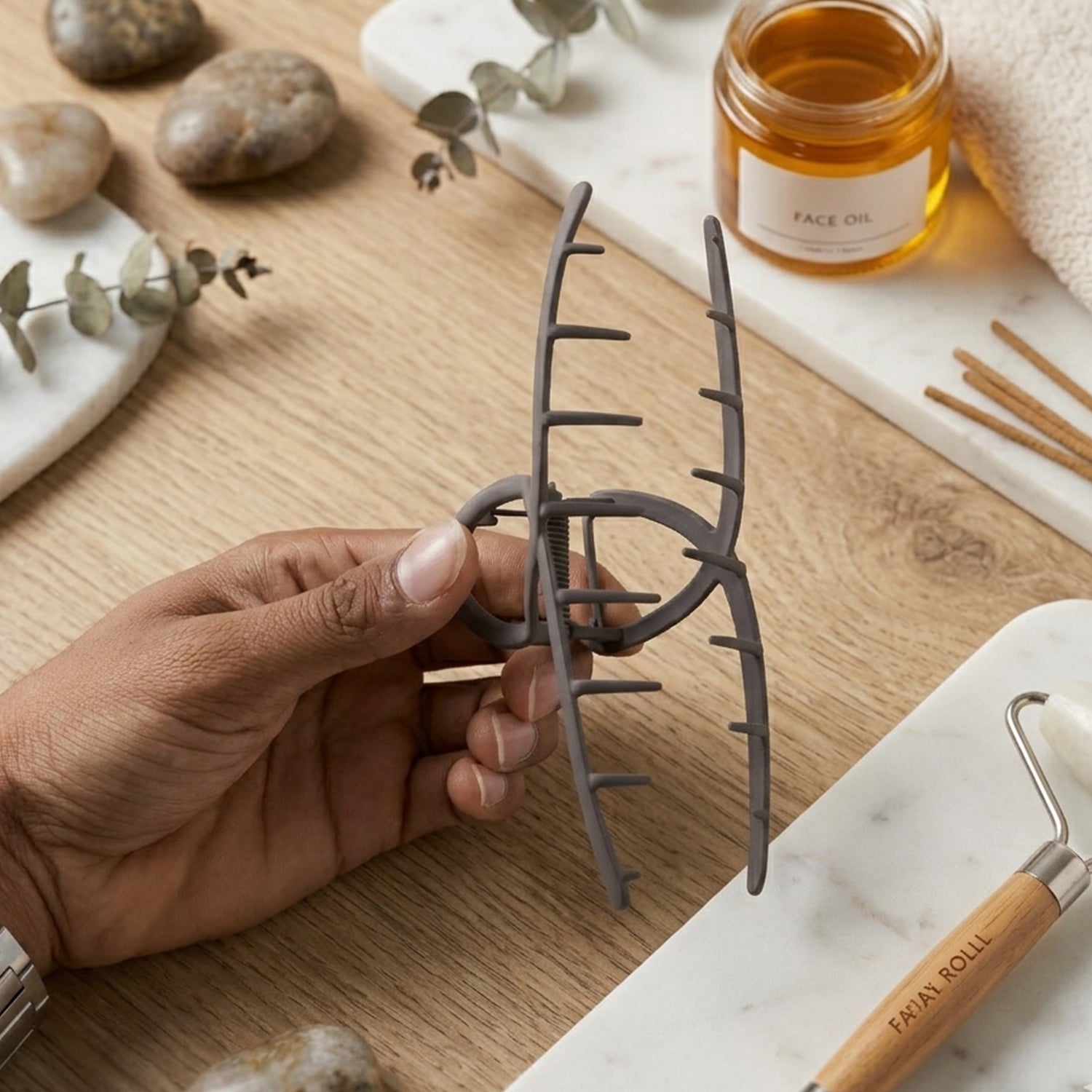 Large Wukusy Strong Grip Hair Claw Clip holding thick hair, showcasing its durable and secure design.