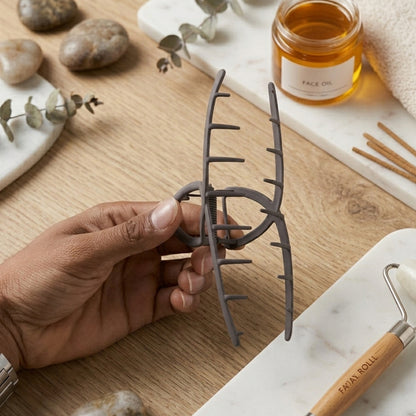 Large Wukusy Strong Grip Hair Claw Clip holding thick hair, showcasing its durable and secure design.