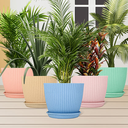 Set of five Wukusy plastic flower pots with matching bottom trays, ideal for indoor and outdoor plant display.