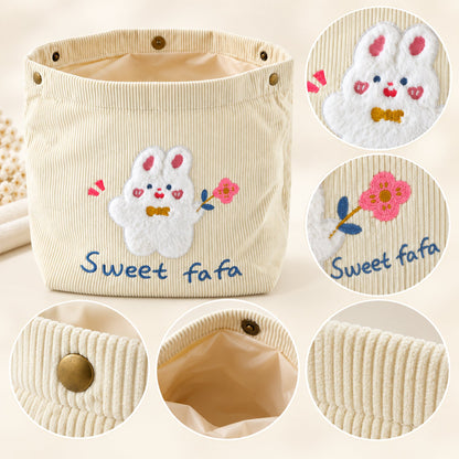Wukusy foldable fabric storage basket with snap closure, ideal for toys, clothes, and home organization.